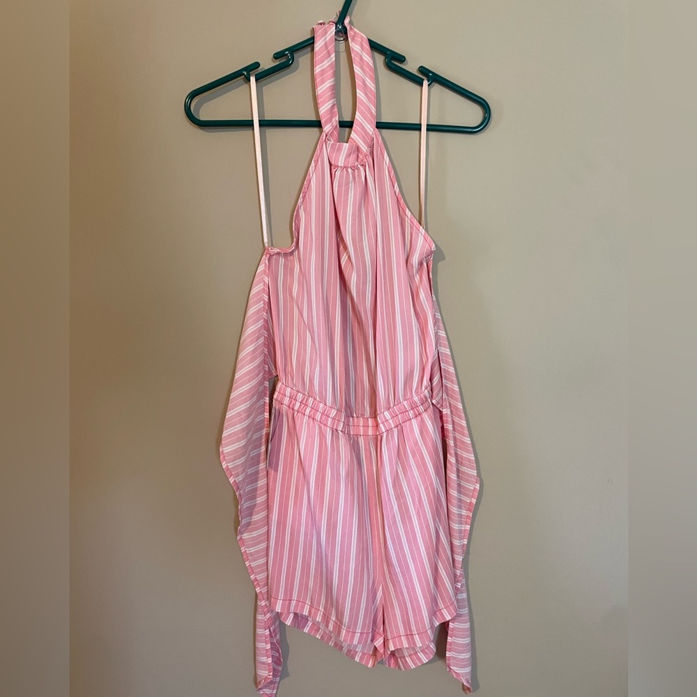 Pink Lily romper. New with tags.